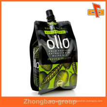 Guangzhou supplier lamimated material leak proof custom plastic drink pouch with spout packaging